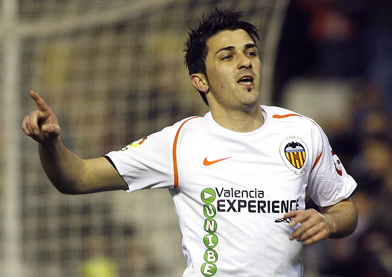 Valencia's Villa celebrates after scoring a penalty against Almeria during their Spanish first division soccer match in Valencia