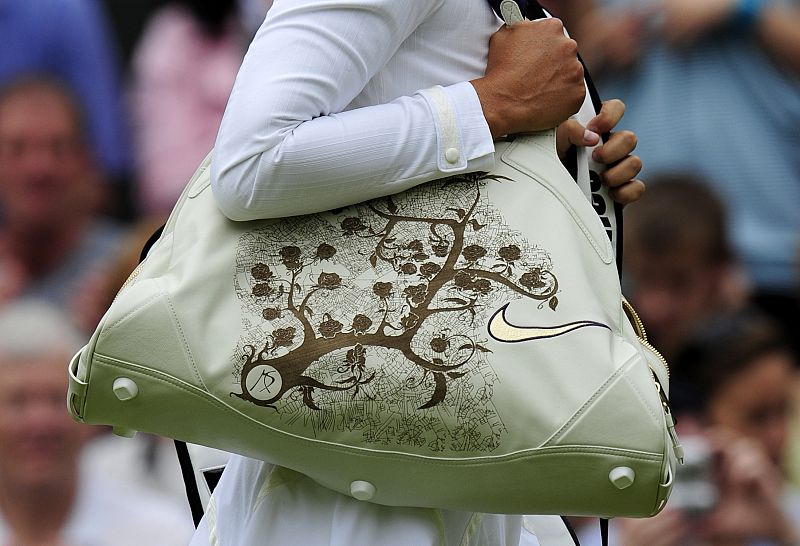 Maria Sharapova of Russia  wallks onto the court before her match against Viktoriya Kutuzova of Ukraine at the  Wimbledon tennis championships in London