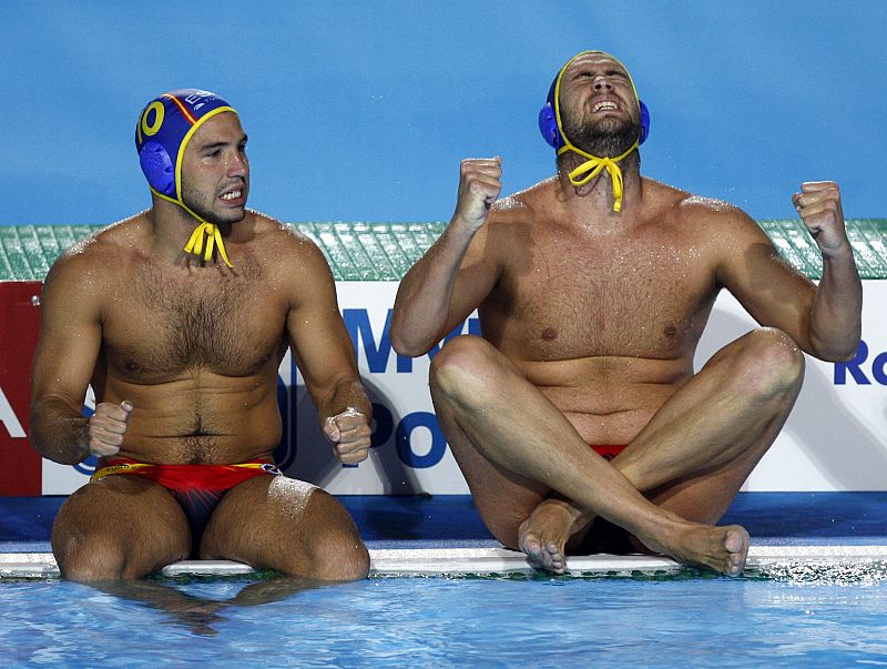 Perrone and Molina of Spain watch the penalty shoot out during their men's water polo gold medal match against Serbia at the World Championships in Rome