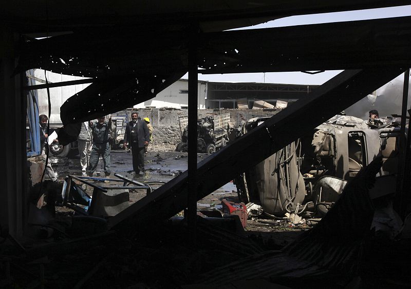 Scene of a suicide attack is photographed from inside a damaged building in Kabul