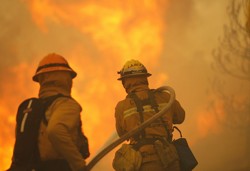Los Angeles County firefighters battle flames during the Station fire in the Acton area of Los Angeles
