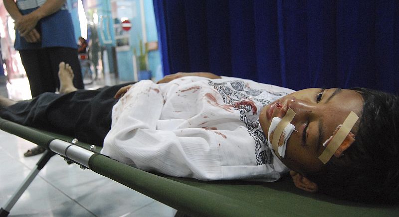 An injured boy receives treatment at a hospital after a earthquake shook Tasikmalaya, West Java