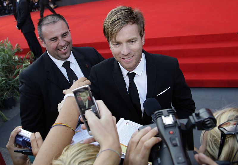 Actor McGregor signs autographs during a red carpet for the premiere of the movie "The Men Who Stare At Goats" at the 66th Venice Film Festival