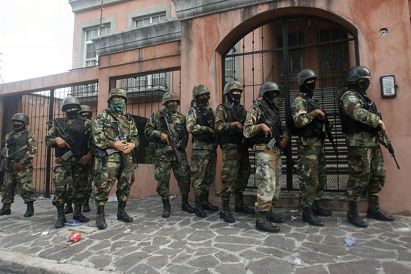 Soldiers stand guard after the dispersal of supporters of ousted Honduras President Manuel Zelaya, outside the Brazilian embassy in Tegucigalpa