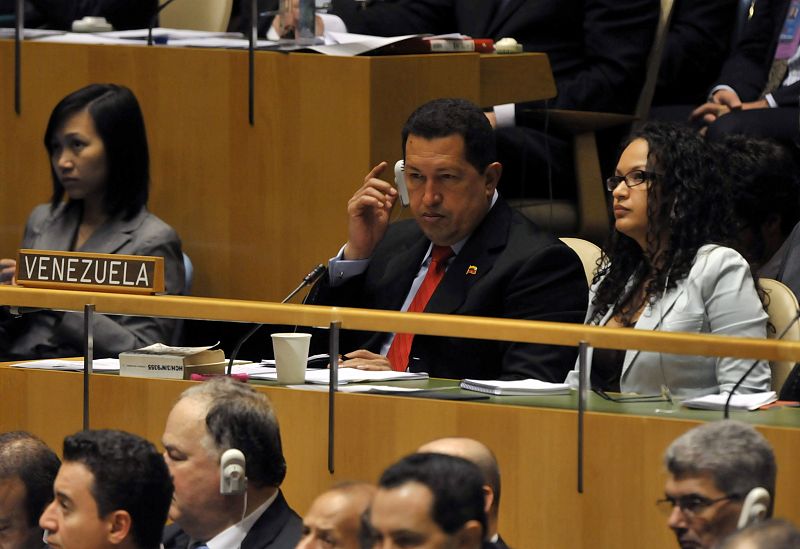 Venezuela's President Hugo Chavez listens as U.S. President Barack Obama addresses the 64th United Nations General Assembly in New York