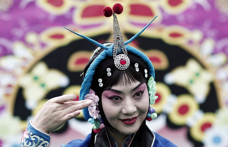 A dancer of the Beijing Opera attends a show at the Frankfurt book fair