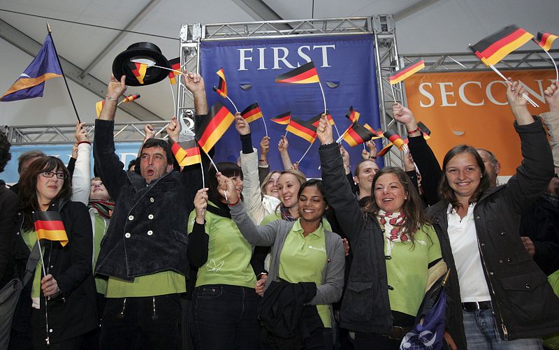 Students of Team Germany react after winning first place overall during the 2009 U.S. Department of Energy Solar Decathlon competition on the National Mall in Washington