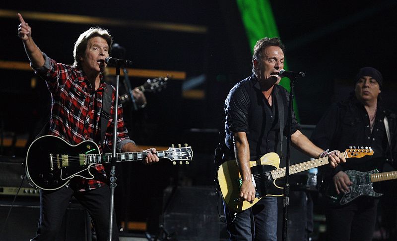 Musician Bruce Springsteen performs with John Fogerty during the first of two 25th Anniversary Rock & Roll Hall of Fame concerts in New York