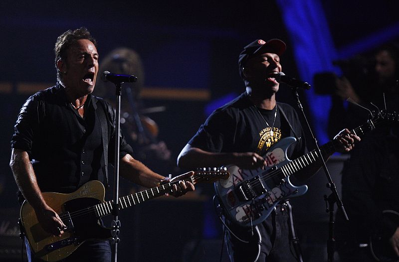 Musician Bruce Springsteen performs with Tom Morello during the first of two 25th Anniversary Rock & Roll Hall of Fame concerts in New York