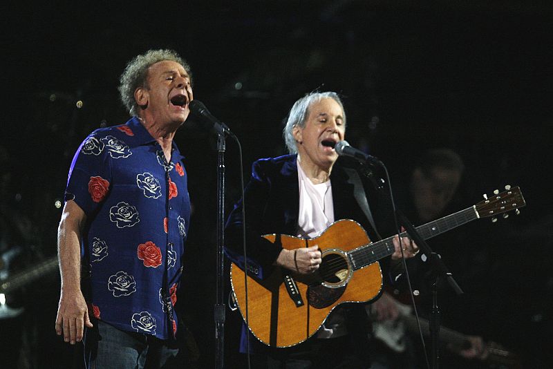 Paul Simon performs with Art Garfunkel during one of two 25th Anniversary Rock & Roll Hall of Fame concerts in New York