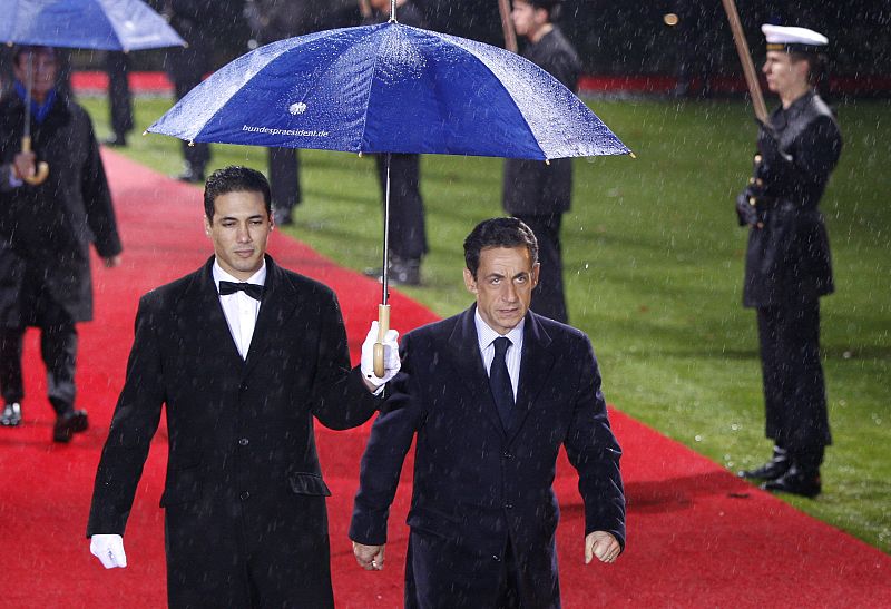 French President Nicolas Sarkozy arrives for a reception at the presidential residence of Bellevue Castle in Berlin