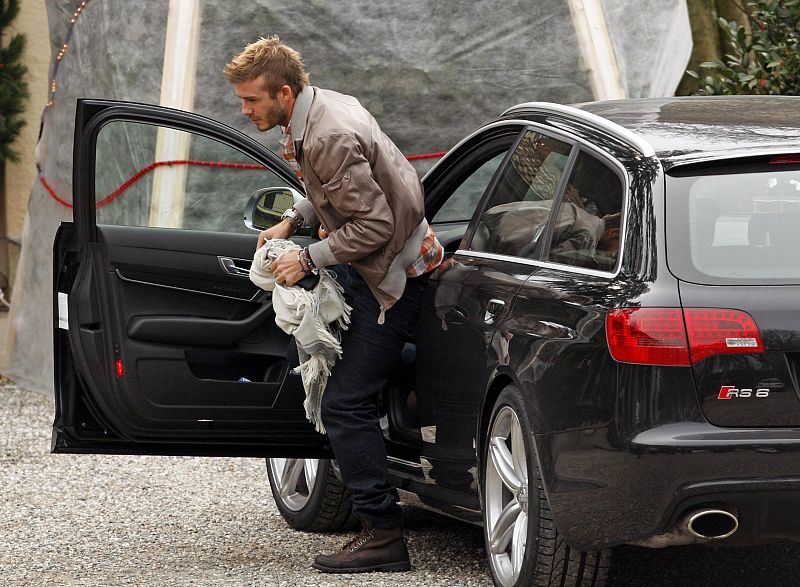 AC Milan's soccer player David Beckham arrives at the Milanello training center in Carnago