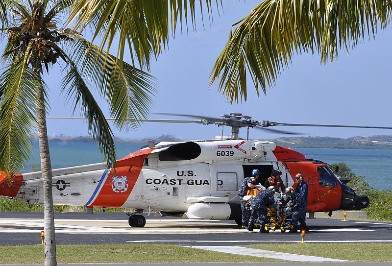 An injured American arrives at U.S. Naval Hospital Guantanamo Bay, Cuba by U.S. Coast Guard helicopter