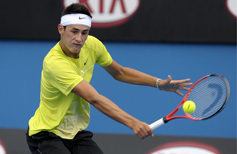 El tenista australiano Bernard Tomic durante el partido de primera ronda del Abierto de Australia de tenis disputado contra el francés Guillaume Rufin.