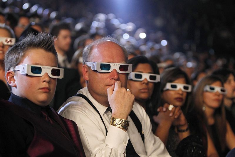 Guests wear 3D glasses during the tribute to Michael Jackson at the 52nd annual Grammy Awards in Los Angeles