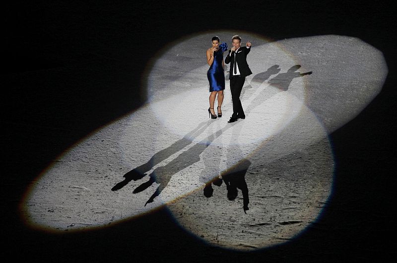 Nelly Furtado and Bryan Adams perform during the opening ceremony of the Vancouver 2010 Winter Olympics