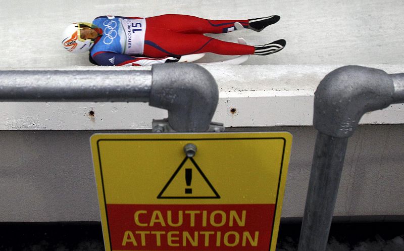 Slovakia's Sisajova speeds down the track during a practice run for the women's singles luge event at the Vancouver 2010 Winter Olympics in Whistler, British Columbia