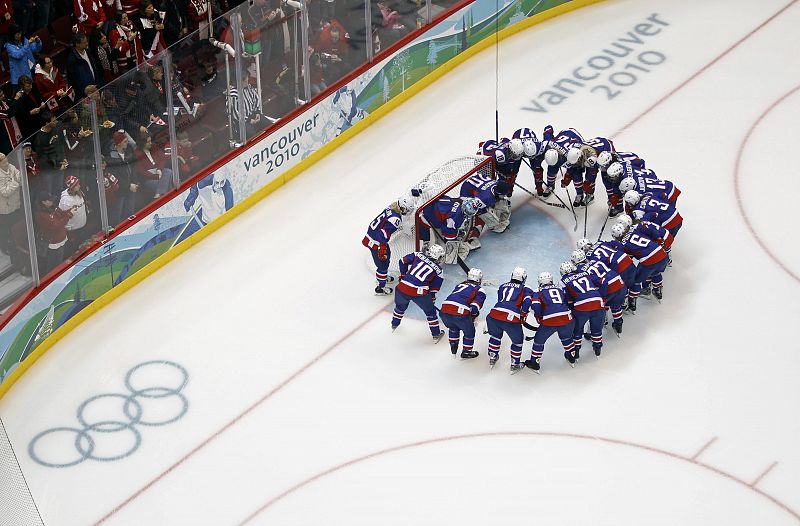 Slovakian women's ice hockey team gather before their preliminary women's hockey game against Canada at the Vancouver 2010 Winter Olympics