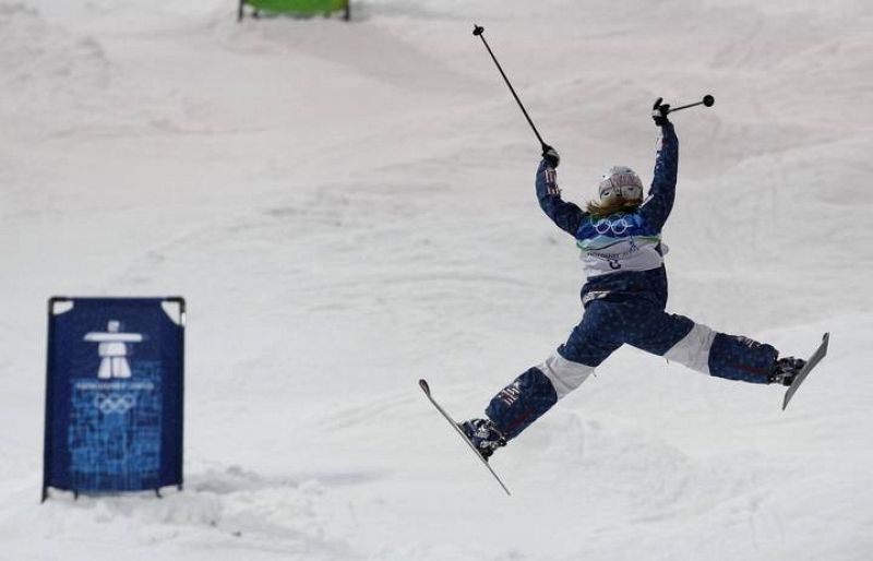 Michelle Roark of the United States leaps during women's freestyle skiing moguls qualifying on Cypress Mountain at the Vancouver 2010 Winter Olympics