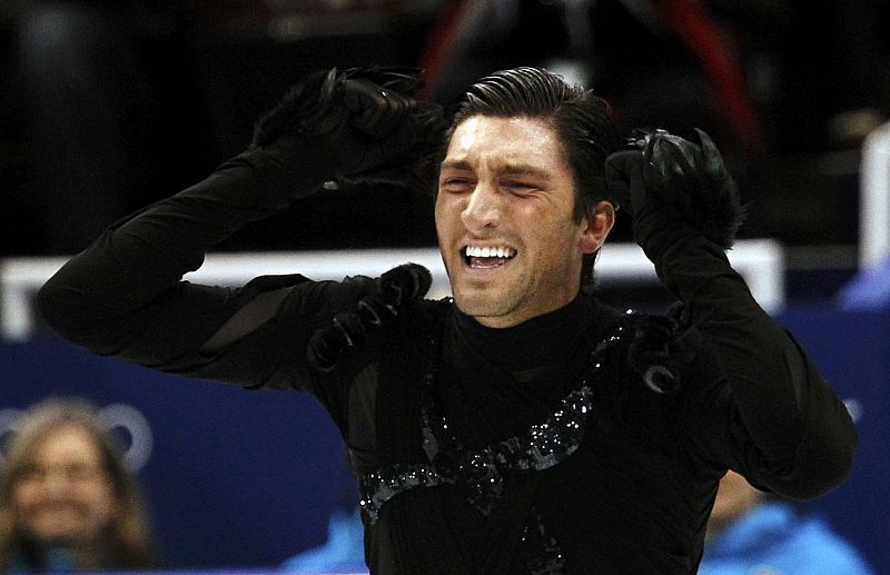 Lysacek of the U.S. celebrates after his routine during the men's short programme figure skating competition at the Vancouver 2010 Winter Olympics