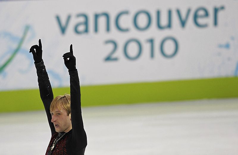 Russia's Evgeni Plushenko gestures after his routine in the men's free skating figure skating competition at the Vancouver 2010 Winter Olympics