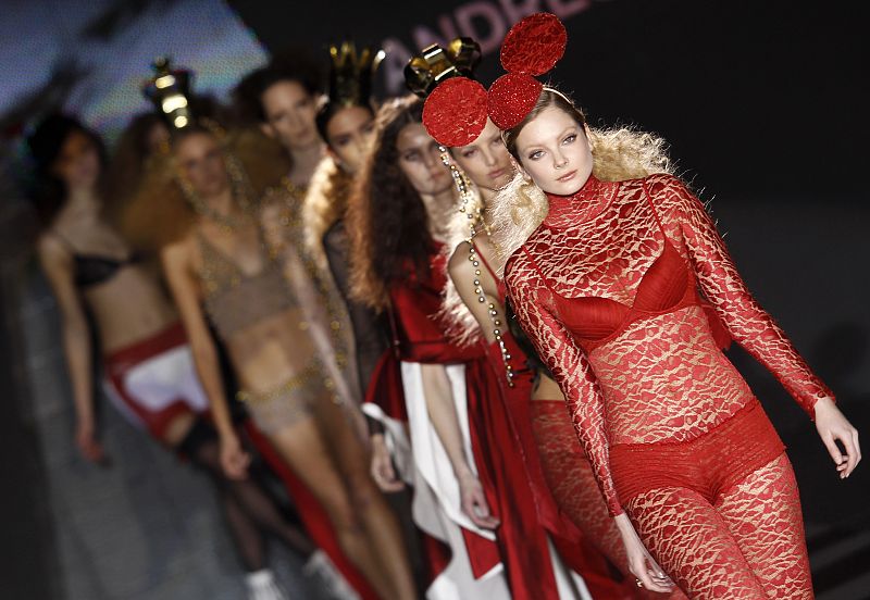 Models display creations by Spanish designer Sarda during the Cibeles Madrid Fashion Week Fall/Winter 2010 show in Madrid