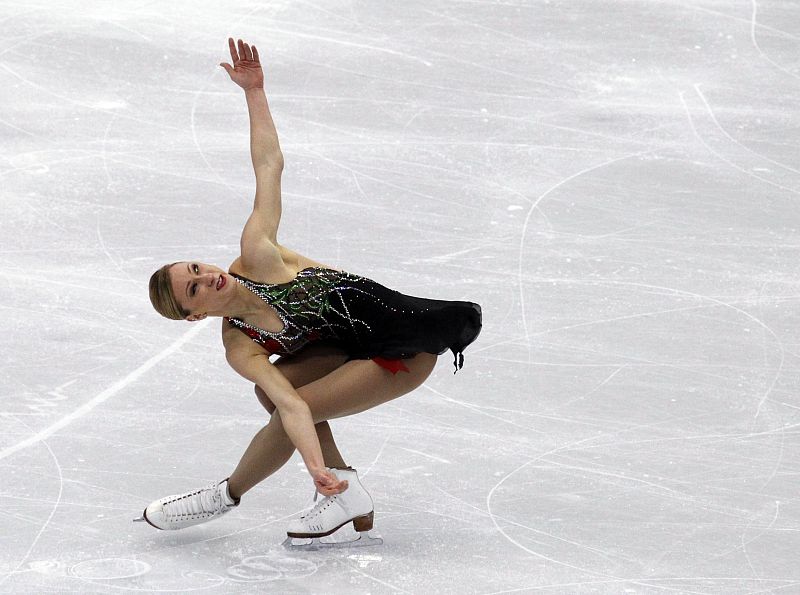 Canada's Rochette performs in women's short programme figure skating event at Vancouver 2010 Winter Olympics