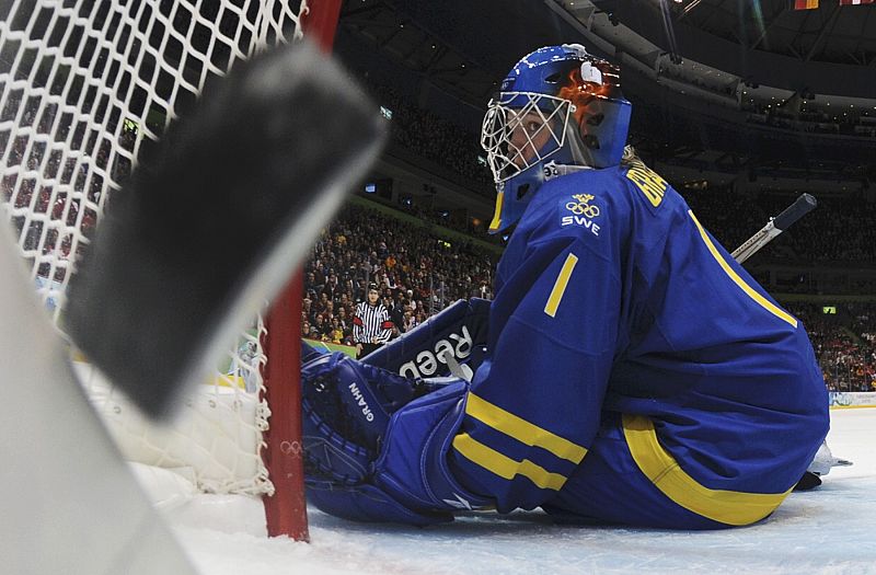 Sweden's goaltender Grahn lets in the game winning goal against Finland in the hockey bronze medal game at the Vancouver 2010 Winter Olympics