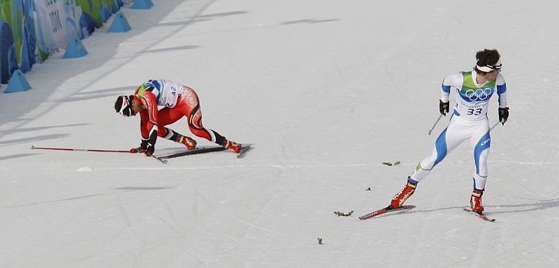 Canada's Jason Myslicki and Slovenia's Mitja Oranic ski to finish line in individual large hill Nordic Combined final at Vancouver 2010 Winter Olympics in Whistler