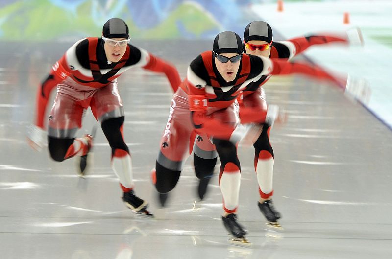 Canada's Morrison, Giroux and Makowsky compete in men's team pursuit speed skating semi-finals at Richmond Olympic Oval during Vancouver Olympics