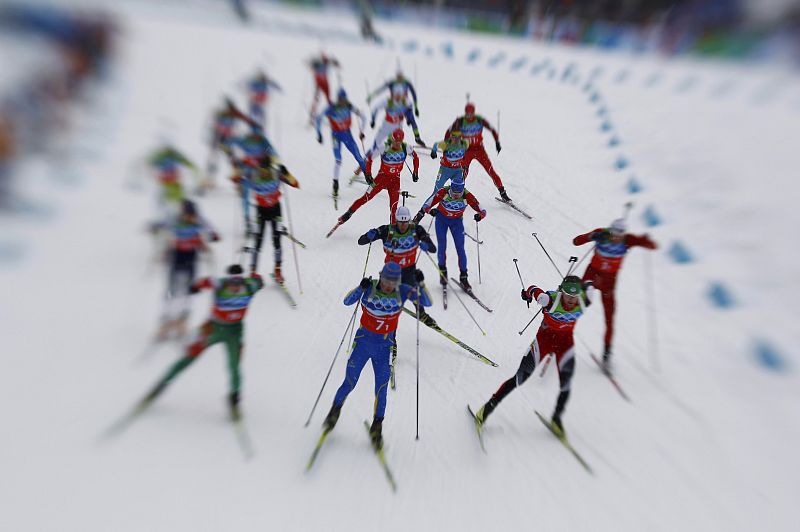 Athletes start the men's 4 x 7.5 km relay biathlon final at  Vancouver 2010 Winter Olympics in Whistler