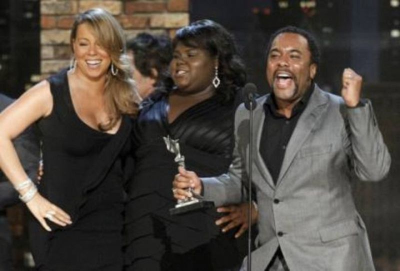 Mariah Carey, Gabourey Sidibe and Lee Daniels accept the best feature award at the 25th Film Independent Spirit Awards in Los Angeles