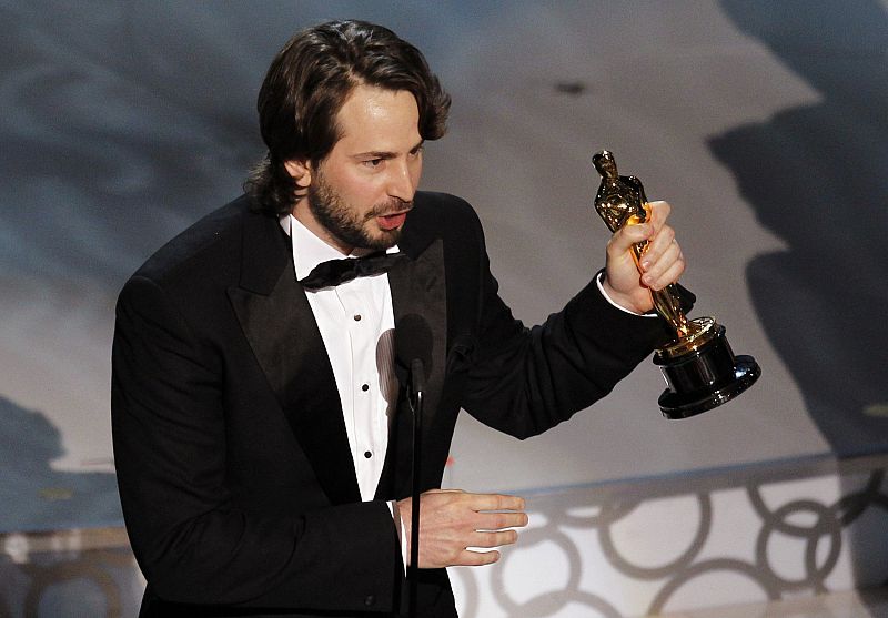 Mark Boal accepts the Oscar for best original screenplay for "The Hurt Locker" during the 82nd Academy Awards in Hollywood