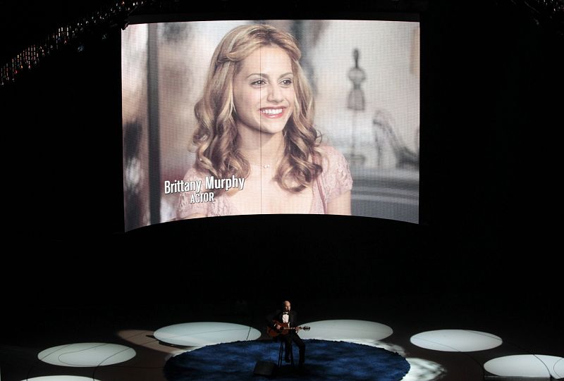 Singer Taylor performs as a picture of actress Murphy is displayed during segment at 82nd Academy Awards in Hollywood