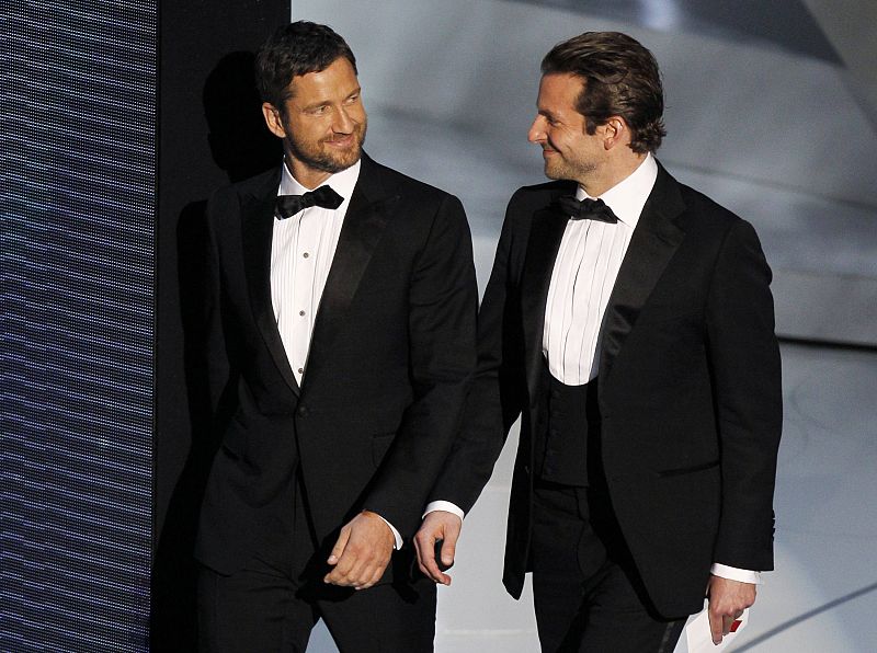 Cooper and Butler arrive to present the best visual effects award during the 82nd Academy Awards in Hollywood