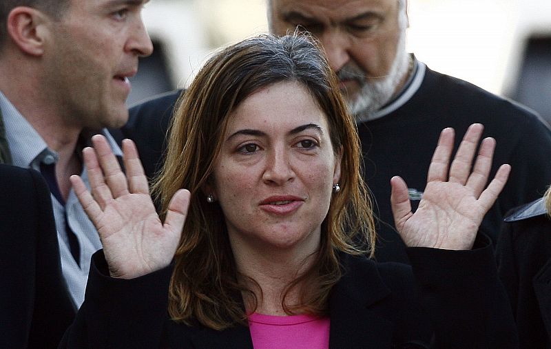 Alicia Gamez gestures during her arrival at Barcelona's airport