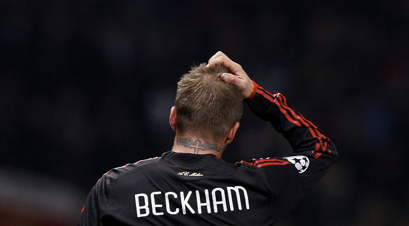 AC Milan's Beckham leaves the pitch following their Champions League match against Manchester United at Old Trafford in Manchester