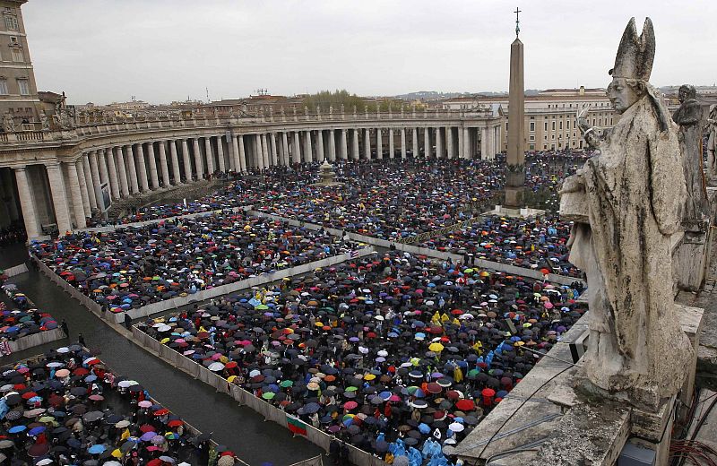 The faithful gather as Pope Benedict XVI leads the Easter mass in Saint Peter's Square at the Vatican