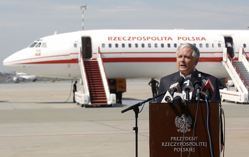 File photo of Kaczynski speaking in front of a Polish government Tupolev Tu-154 in Krakow