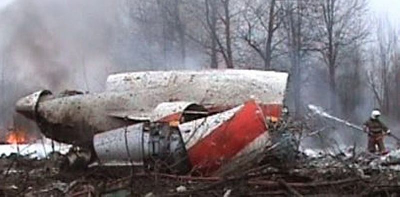 Image from video footage shows a firefighter working to extinguish the flames from the wreckage of a Polish government Tupolev Tu-154 aircraft that crashed near Smolensk airport