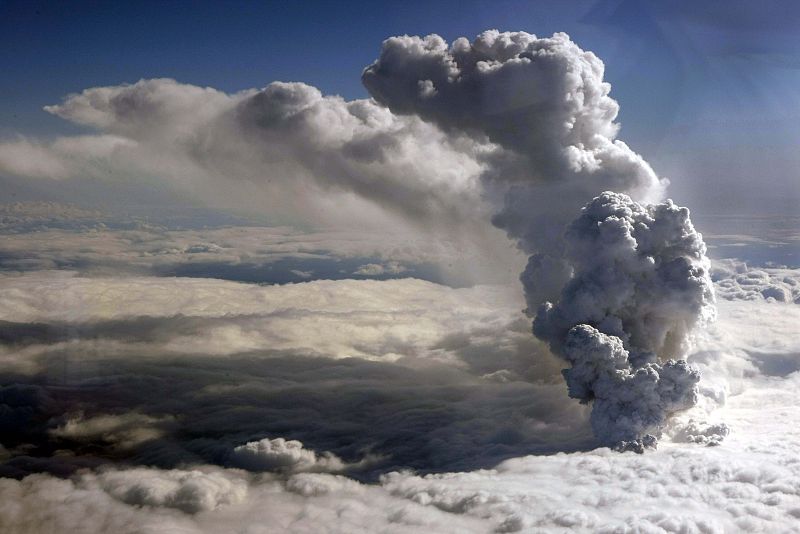 An aerial handout photo from the Icelandic Coast Guard shows a plume of steam rising 22,000 feet (6700 meters) from a crater under about 656 feet (200 metres) of ice at the Eyjafjallajokull glacier in southern Iceland