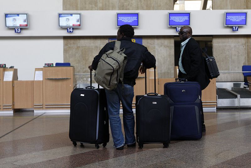 Passengers wait at Strasbourg airport in Entzheim