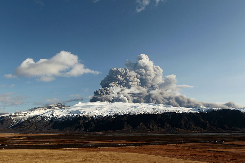Ashes, smoke, and rocks are thrown skyward as a volcano continues to erupt near Eyjafjallajokull