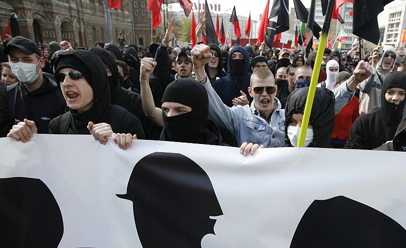 Members of an anti-fascist organisation chant slogans during a rally in Moscow