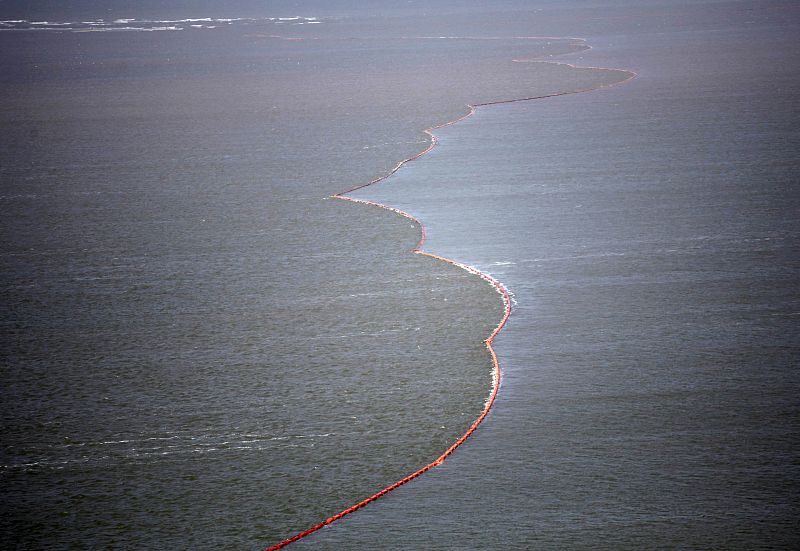 Oil booms are seen near the coast of South Pass, south of Venice, Louisiana, where oil leaking from the Deepwater Horizon wellhead continues to spread in the Gulf of Mexico