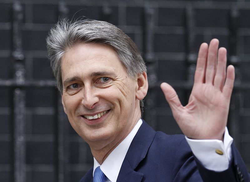 Hammond MP arrives at the 10 Downing Street official residence of Britain's Prime Minister Cameron in London