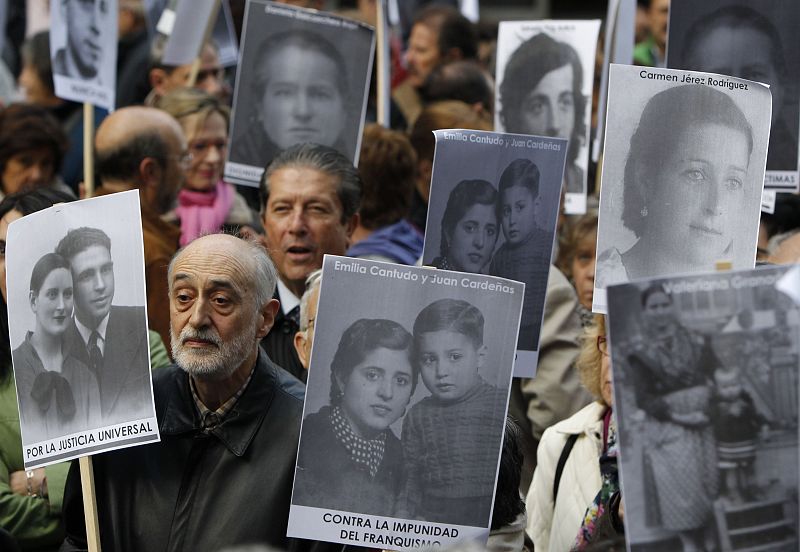 People take part in a demonstration in support of Spanish High Court judge Baltasar Garzon in Madrid