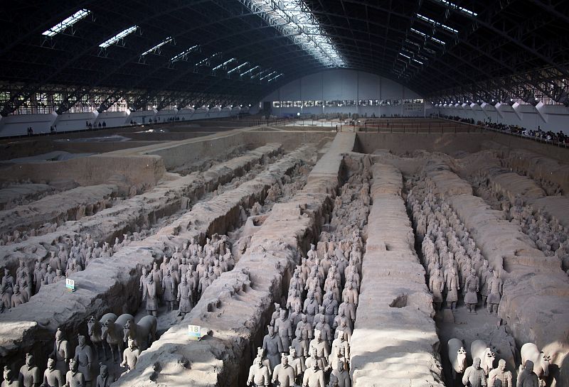 Terracotta warriors can be seen in rows at the excavation site located on the outskirts of the Chinese city of Xian