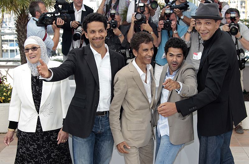 Director Bouchareb poses with cast members during a photocall at the 63rd Cannes Film Festival