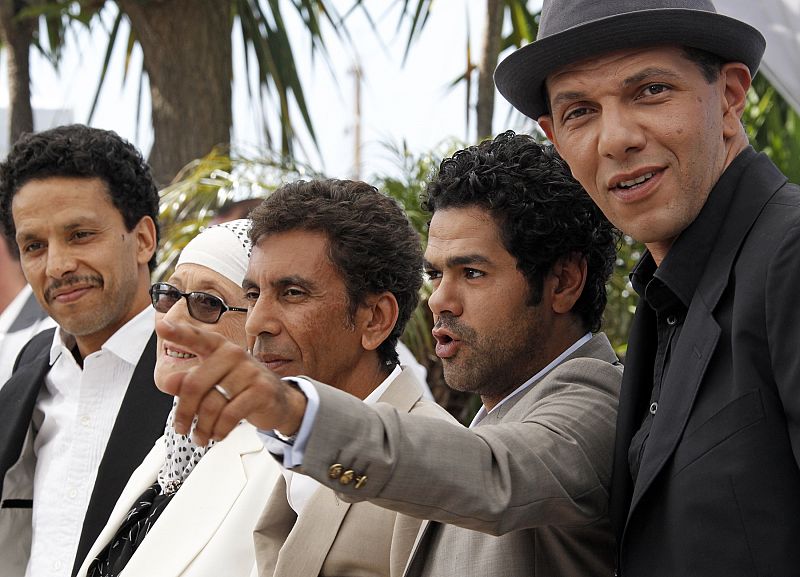 Director Bouchareb poses with cast members during a photocall at the 63rd Cannes Film Festival